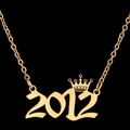 Golden 2012 year number pendant necklace with crown detail on black background - 2012 / Gold