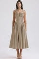Detail of khaki halter neck floral maxi dress with waist cinching and ruffled hemline - Coffee