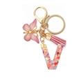 Pink resin letter V keychain with butterfly charm and colorful heart sequins - Letter V