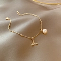 Elegant gold chain bracelet featuring white pearl and shimmering zircon whale tail charm - D002 Gold - Fishtail Bracelet