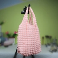 Pink waffle texture tote bag with bubble pleat design and dual top handles - Pink