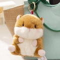 Plush brown and white hamster bag charm with golden metal ring and striped ribbon loop - Brown Hamster