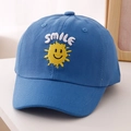 Detailed close-up of kids' blue cotton baseball cap with Smile sun 3D embroidery - 52cm 2-5 Years Old / Blue
