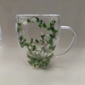 Double-walled glass cup with handle featuring green and white dried flowers inside - 350ml-Green and White Dried Flower Decoration