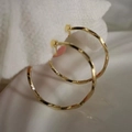 Elegant gold twisted spiral hoop earrings for women with minimalist curved metal design - Gold Twisted Large Hoop Earrings