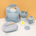 Light blue silicone baby feeding set with suction plate, bowl, bib, and wooden utensils - Orange Blue