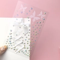 White butterfly and ribbon bow facial stickers with iridescent rhinestones for makeup - White Bow Jewels (BJA-667)