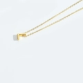 Minimalist gold letter L pendant necklace with delicate chain in a polished finish - L