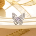 Silver butterfly ear stud with clear crystals and a central light purple zircon stone - Blue-Purple