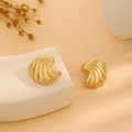 Polished gold stud earrings with elegant seashell ripple design in a warm artistic setting - E6204-18-3D Shell Texture