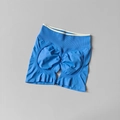 Macro detail of seamless sky blue yoga shorts featuring high waist and scrunch butt design - Electric Blue