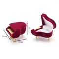 Macro detail of piano shaped velvet jewelry box in burgundy with dimensions - 7# Red Piano