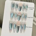 Blue cat eye and pearl press-on nails with floral art in long coffin and stiletto shapes - XS / Extra Long Coffin Shape
