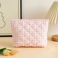 Close-up of pink and white checkered quilted makeup bag with soft fabric texture - 27x6.5x17.5cm / Pink Plaid Cotton