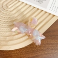 Elegant pink marble acetate bow hair claw clip displayed on a minimalist wooden tray - Colorful 8CM