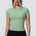 Vue détaillée du t-shirt de sport vert clair ajusté en tissu élastique à séchage rapide - Menthe Grise
