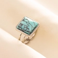 Detail of square turquoise stone ring with black veins on minimalist silver band - Silver/Light Blue Turquoise
