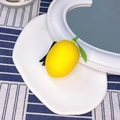 Realistic yellow lemon hair clip with green leaf and black metal duckbill hairpin detail - Lemon