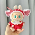 Labubu doll in red plaid hoodie with bunny ears and cherry detail on gray background - Red And White Checkered Sweet Cherry Blossoms / First And Second Generation Keychains Are Compatible With La Cloth Dolls. Dolls Not Included.