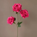 Detailed view of artificial 3-head rose bouquet in magenta with green leaves and stems - Rose Red