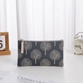 Grey travel makeup bag with white tree pattern and zipper closure for cosmetics storage - Wishing Tree (No Label) / Large