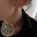 Minimalist square silver metal hoop earrings shown on model and as a product pair - Silver Square Ear Buckle (ED1696)