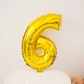 Shiny gold number 6 foil balloon for birthday party decor on a minimalist white stand - Number 6 / 16" / Gold