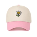 Close-up of daisy sunflower embroidery with smiley face on a panelled baseball cap - Beige/Pink