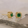 Macro detail of square emerald-cut green gemstone earrings with pavé zircon halo - Emerald