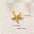 Detail of 14k gold starfish pendant with exact dimensions 13mm by 8.7mm and 0.4g weight - A0569 Mini Starfish