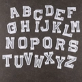 Set of 26 white embroidered A-Z letter patches with silver borders on a dark stone surface - AAC-C-1-7*Silver Letters*Set of 26 Letters