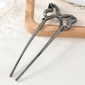 Elegante horquilla de metal negro en forma de U con diseño de lazo hueco para moños de mujer - Color gunmetal