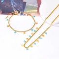 Set collana e bracciale in acciaio inossidabile dorato con stelle in smalto celeste - Set Collana e Bracciale Stella