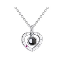 Detail of silver heart projection necklace with Roman numerals and pink gemstone - Heart White Gold