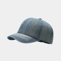 Detail view of washed blue denim baseball cap with vintage six-panel stitching and top button - Adjustable / Medium Blue