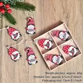 Set of 8 wooden Christmas gnome ornaments in red and white with Merry Christmas text - Style K