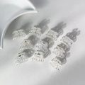Set of 10 mini iridescent butterfly hair clips with transparent rainbow finish for styling - Pumpkin Flower