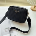 Black woven texture camera bag with gold triangle plaque and wide fabric crossbody strap - Black