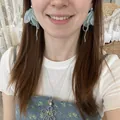 Close-up of mint green handmade beaded flower earrings and matching silver necklace on model - 3# 925 Sterling Silver Earring Post-Green Gold-Petal Beaded (HE24970)