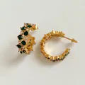 Golden C-shaped hoop earrings featuring green and white zirconia pavé setting - Green Zirconia / Gold