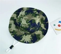 Kids dinosaur camouflage bucket hat with adjustable white drawstring chin strap - 54cm / Camouflage