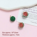 Detailed close-up of 10x12mm gold-plated watermelon charms for DIY jewelry making - Watermelon