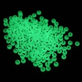 Luminous round beads 7x4mm with black letter T glowing bright green in the dark - Letter T / Luminous Green