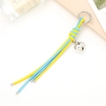 Detail showing blue and yellow braided leather keychain with silver heart pendant - Charm / Lake Blue + Yellow