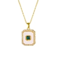 Detailed close-up of 18K gold plated necklace with green gemstone and zircon halo - Square Green Zirconia Necklace