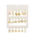 Golden earrings set featuring butterfly, heart, and dragonfly designs on white card - KC Gold (1102)