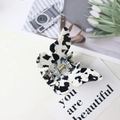 Chic butterfly hair claw clip with black and white cow print patterns in acetate material - Black and White Pattern