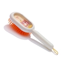 Dettaglio spazzola per capelli bambini con retro trasparente e motivi di orso e papera - Giallo