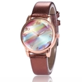 Detail of rose gold quartz watch featuring rainbow dial and brown lizard pattern leather strap - Coffee