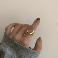 Anello aperto minimalista con due motivi floreali dorati e finitura lucida a specchio - Aperto Regolabile / Oro